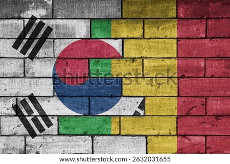 colourful painted big national flag of south korea and flag of mali on a massive old brick wall background.