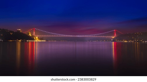 Colourful panoramic view of the Bosphorus at dawn. Rumeli tower and Fatih Sultan Mehmet bridge.  Turkey  - Powered by Shutterstock