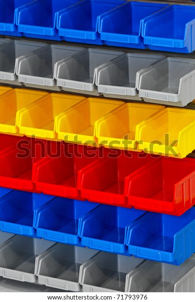 Colourful plastic\
open box container in\
warehouse