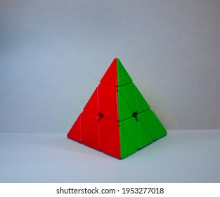 Colourful Pyraminx Cube, Puzzle Box Shap In White Background