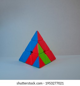 Colourful Pyraminx Cube, Puzzle Box Shap In White Background