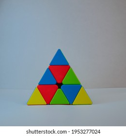 Colourful Pyraminx Cube, Puzzle Box Shap In White Background