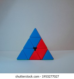 Colourful Pyraminx Cube, Puzzle Box Shap In White Background