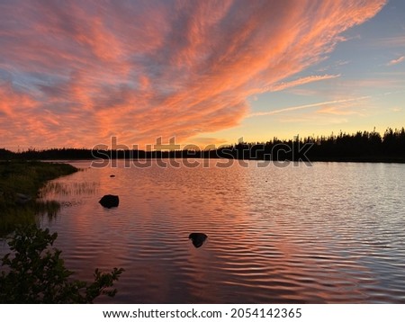 Colourful Red Sunset over Cobbs Pond in Gander, Newfoundland and Labrador