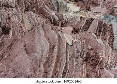 Colourful Rocks In East Greenland Close Up. Rock Texture.