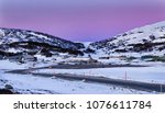 Colourful sunrise over Perisher valley regional remote town in SNowy Mountains of Australia - national skiing resort and popular tourist destination for ski and snowboarding activities.