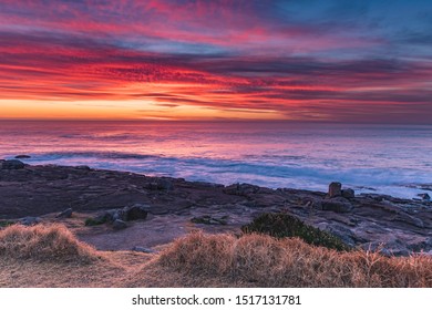 Colourful Sunrise Seascape - Short Point at Merimbula on the South Coast of NSW, Australia.