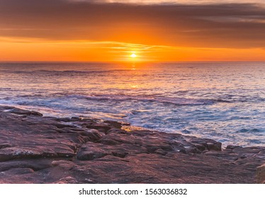 Colourful Sunrise Seascape from Short Point at Merimbula on the South Coast of NSW, Australia.