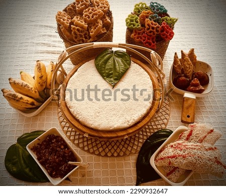Colourful Sweet table with Srilankan traditional sweets and decorated with oil lamp and betel leaves for Sinhala and Tamil New Year in Sri Lanka 