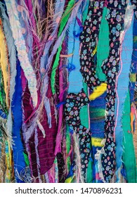 Colourful Torn Fabric Strips, Cords And Wool, Sewn Together In A Striped Pattern. Textile Art Textured Background. Vertical.