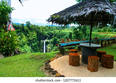 Colourful Tropical Paradise Garden In Oceania, Wooden Shelter With Palm Thatch Roof, Jungle Forest Lookout, Sopoaga Falls Resort In Samoa, Upolu Island