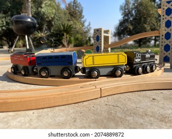 Colourful Wooden Train Set In The Garden