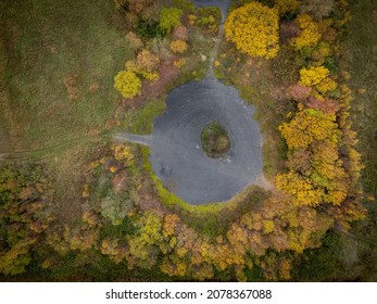 Colourful Yellow And Brown Treetops In A Field Seen From Above With Drone Aerial Top Down View. Autumn Scene At Canvey Wick In Essex, UK