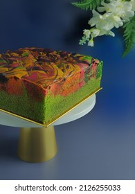 A Colouring Butter Cake On A Turntable