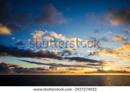 Colred Sunrise Clouds over the Atlantic Ocean in Tenerife Canary Islands