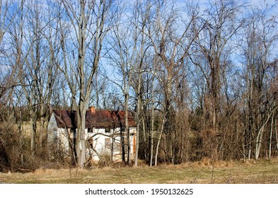 Columbia, MD USA - April 15, 2007: An Abandoned House In The Woods.