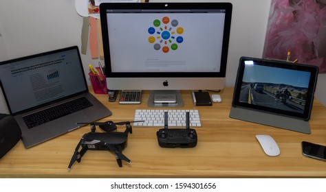 Columbia, MD / USA - Dec 20, 2019:
Office Desk With A Drone, Laptop, And An Ipad On It.