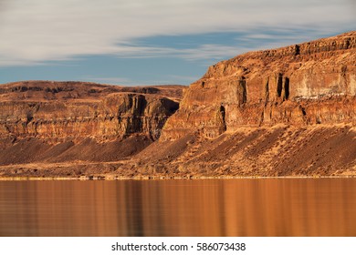 Columbia River Below Eroded Cliffs Of Ancient Lava Flows Carved By Missoula Floods Of Previous Ice Age In Central Washington State