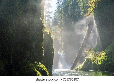 Columbia River Gorge - Hood River, Oregon. Sun Shines On Small Waterfall And Forest Stream