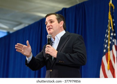 Columbia, South Carolina - February 17, 2016: Presidential candidate Ted Cruz(R) speaks to a crowd of supporters at The Columbia Armory in South Carolina.
