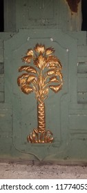 Columbia, South Carolina / USA - 09/11/2018: Antique Gold Palmetto Emblem On Green Historic Bridge Post Railing