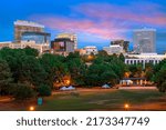 Columbia, South Carolina, USA downtown city skyline from Finlay Park at dusk.