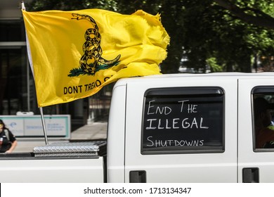 Columbia, South Carolina/USA April 24,2020 Anti-Lockdown Covid 19 Protestors Gathered At The SC State House Carrying Signs And Honking Horns In Protest Of Businesses, Schools And Other Non-essentials