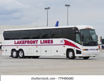 COLUMBUS, OHIO—SEPTEMBER 2017: Close Up Of A Lakefront Lines Bus Waiting To Pick Up Passengers At A Parking Lot. 