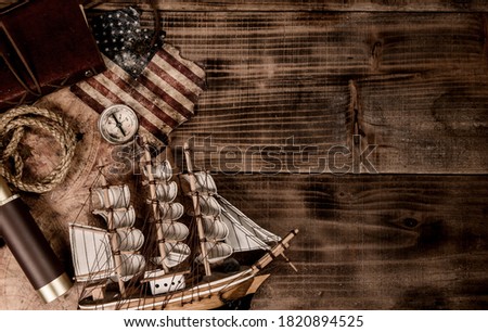 Columbus Day background. Map and discovery of old equipment. Exploration and history of America in October.