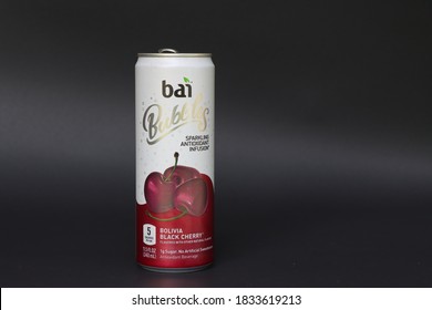 COLUMBUS, GEORGIA/ USA - 09-08-2020
Can Of Bai Bubbles Black Cherry Drink Against Dark Backdrop.