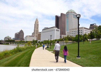 COLUMBUS, OH - JUNE 28: Walkers on the Scioto Mile in downtown Columbus, Ohio are shown on June 28, 2017.