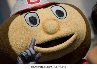 Columbus, Ohio: Brutus Buckeye, Ohio State mascot, cheers for the crowd