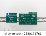 Columbus, Ohio highway 70 road in midwest city with fog mist cloudy day, exit signs for Parsons and Livingston Avenue, Fourth street