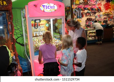 Columbus, Ohio September 16, 2019: Kids Playing Arcade Games At Local Skating Rink.