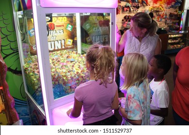 Columbus, Ohio September 16, 2019: Kids Playing Arcade Games At Local Skating Rink.