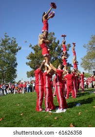 COLUMBUS, OHIO - SEPTEMBER 18: The Ohio State cheerleaders entertain the crowd before their game  on September 18, 2010 in Columbus, OH.