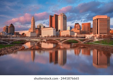 Columbus, Ohio, USA. Cityscape image of Columbus , Ohio, USA downtown skyline with the reflection of the city in the Scioto River at spring sunset. - Powered by Shutterstock