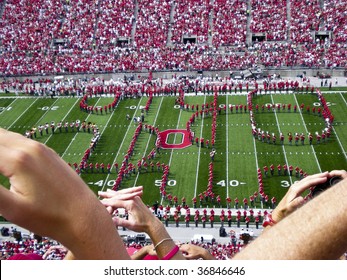 COLUMBUS,OH-SEPTEMBER 5:  The Ohio State Alumni Band Performs The Famous Script Ohio With The Current OSU Band Before The Game Against Navy On September 5, 2009.