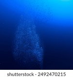 A column of bubbles rises to the surface on the seafloor.