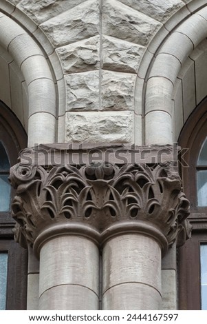 Column capital decoration. Architectural feature or detail in Old City Hall Building (1898), Toronto, Canada