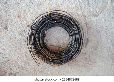 Column Lintel Wire on cement ground. Column Lintel Wire is helpful for installing lintel and cast the concrete.