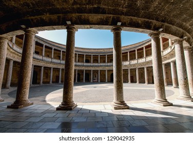 A Columned Courtyard At The Palace Of Charles V (Palacio De Carlos V), Site Of The Museum Of The Alhambra In Granada, Spain.