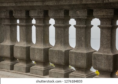 Columned Gray Stone Wall With Nice Ornaments