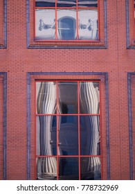 Columns Distorted Reflection in Windows to Look Like Curtains