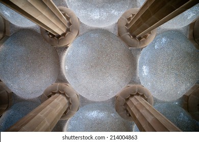 Columns and domes, tiled ceiling of Hypostyle Room in Park Guell, Barcelona, Catalonia, Spain.