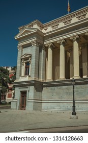 Columns With Ionic Capitals On West Facade Of Casón Del Buen Retiro, An Annex Of The Prado Museum Complex In Madrid. Capital Of Spain This Charming Metropolis Has Vibrant And Intense Cultural Life.