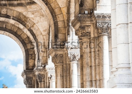 Columns on passage in basilica of the Sacred Heart of Paris or Basilica Coeur Sacre on Montmartre in Paris