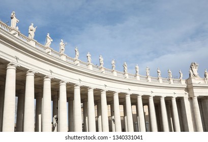 Columns And Statues Above The Colonnade Of The Architect Bellini In The Saint Peter Square In The Vatican City In Central Italy