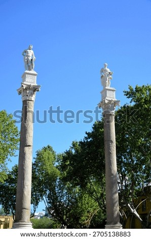 Columns with the statues of Hercules and Julius Caesar in the 