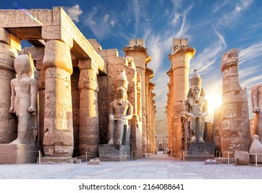 Columns and statues of the Luxor temple main entrance, first pylon, Egypt